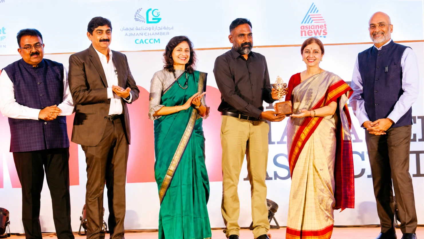 Chandrasekhar G receiving the Best Sustainability Startup Award at an Asianet News event