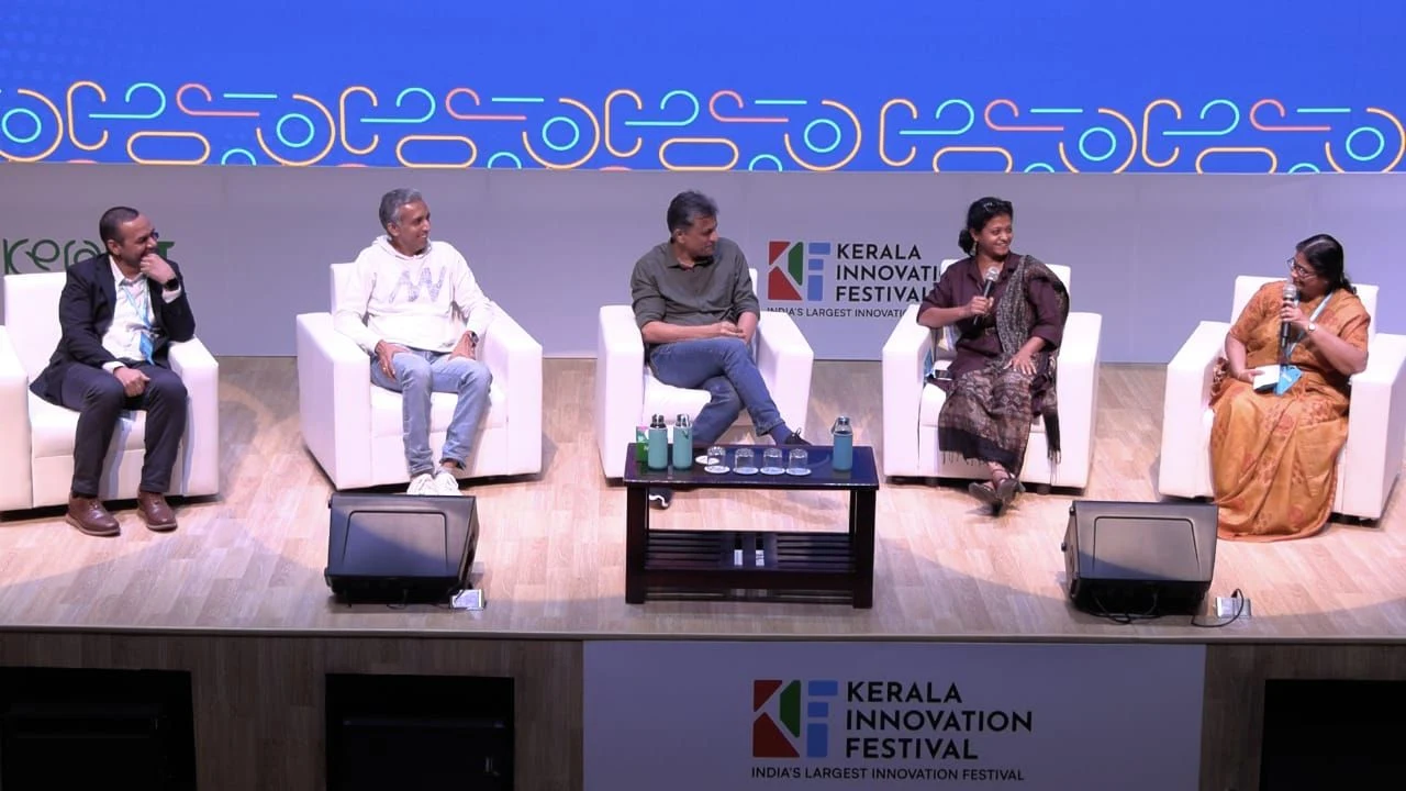 Panel discussion on stage at the Kerala Innovation Festival