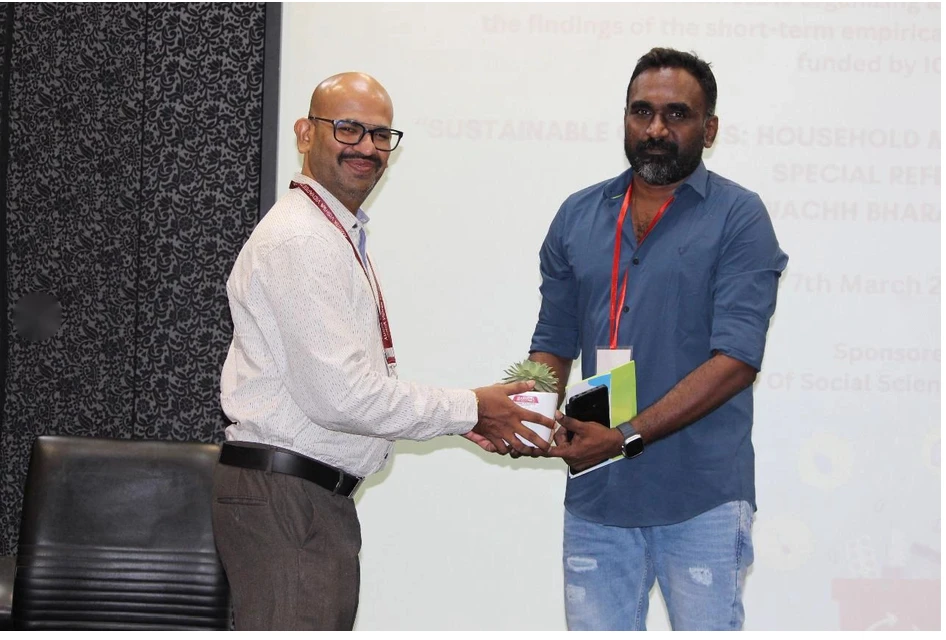 Chandrasekhar G being welcomed at a seminar on sustainable household waste practices